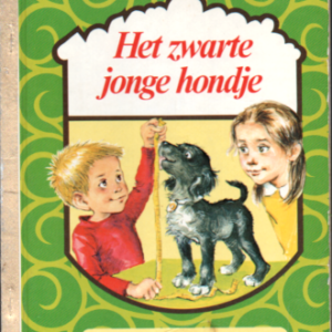 Het zwarte jonge hondje